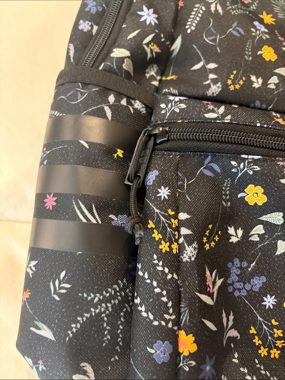 adidas Black Floral Print Backpack with Yellow, Pink and Blue Flowers